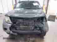 2013 Nissan Frontier SV with VIN 1N6AD0EV5DN734619, listed as a IAAI auction lot 41300993 with 104,013 mi miles and . Bid and sale history available at DreamBid. Image 6.