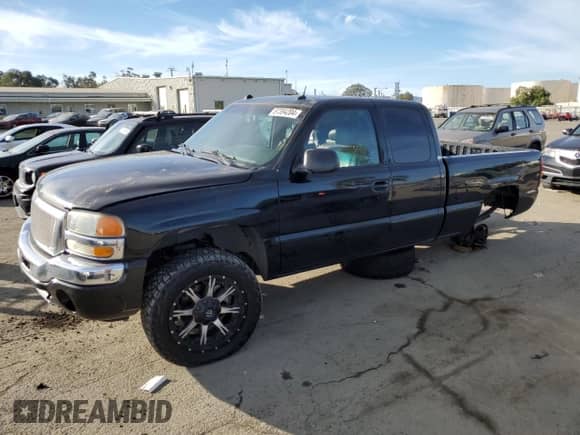 2005 GMC Sierra 1500 SLT with VIN 1GTEC19T35Z138635, listed as a Copart auction lot 87394204 with 115,591 mi miles and Salvage title. Bid and sale history available at DreamBid. Image 1.
