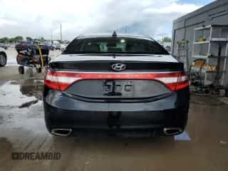 2013 Hyundai Azera с VIN KMHFH4JG7DA199128, выставлен на аукционе Copart как лот 81682065 с пробегом 130 029 миль миль и Чистый • Clean title. История ставок и продаж доступна на DreamBid. Изображение 6.