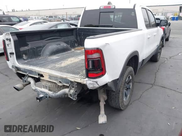 2020 Ram 1500 Rebel with VIN 1C6SRFET1LN281180, listed as a IAAI auction lot 42444524 with 176,192 mi miles and . Bid and sale history available at DreamBid. Image 4.