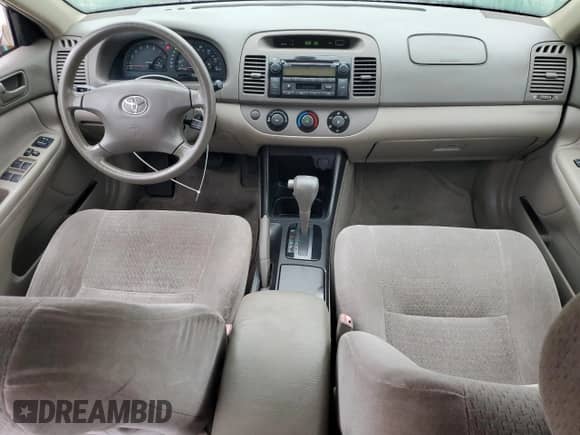 2004 Toyota Camry LE с VIN JTDBE32K540245988, выставлен на аукционе Copart как лот 85377585 с пробегом 137 147 миль миль и Списание • Salvage title. История ставок и продаж доступна на DreamBid. Изображение 8.