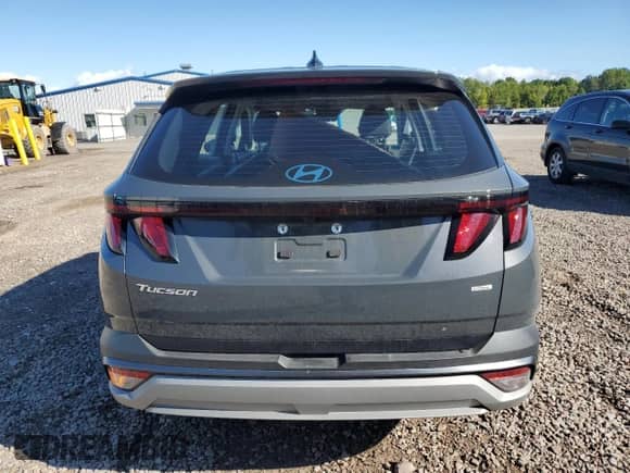 2025 Hyundai Tucson SE with VIN 5NMJACDE3SH528451, listed as a Copart auction lot 71825415 with 10,712 mi miles and Salvage title. Bid and sale history available at DreamBid. Image 6.