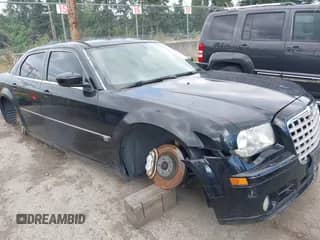 2006 Chrysler 300 C SRT-8 with VIN 2C3LA73W36H450317, listed as a IAAI auction lot 43148082 with 110,634 mi miles and . Bid and sale history available at DreamBid. Image 1.