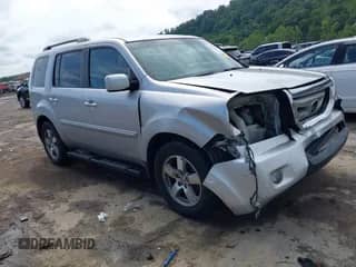 2011 Honda Pilot EX-L with VIN 5FNYF4H54BB045374, listed as a IAAI auction lot 42788394 with 208,681 mi miles and . Bid and sale history available at DreamBid. Image 1.