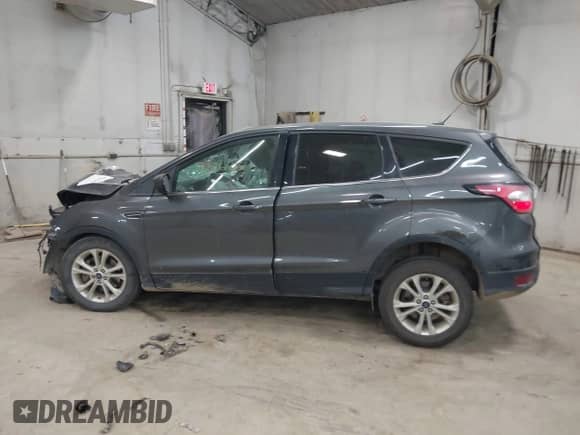 2017 Ford Escape SE with VIN 1FMCU9GD9HUE89531, listed as a IAAI auction lot 43261281 with 101,739 mi miles and . Bid and sale history available at DreamBid. Image 15.