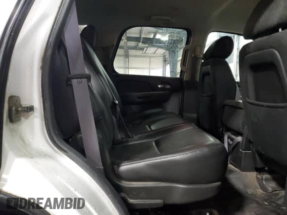 2014 Chevrolet Tahoe Commercial z VIN 1GNSK2E02ER141217, wystawiony jako Copart lot #84096704 z przebiegiem 213 255 mil mil oraz Nie do naprawy • Non repairable. Historia ofert i sprzedaży dostępna na DreamBid. Obrazek 11.