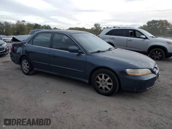 2000 Honda Accord LX с VIN 1HGCG6652YA137124, выставлен на аукционе Copart как лот 84577685 с пробегом 205 139 миль миль и Списание • Salvage title. История ставок и продаж доступна на DreamBid. Изображение 4.