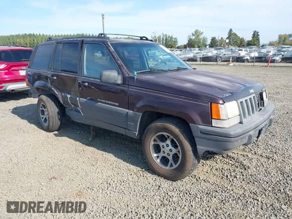 1996 Jeep Grand Cherokee Laredo z VIN 1J4GZ58S2TC262980, wystawiony jako IAAI lot #41949514 z przebiegiem 269 674 mil mil oraz . Historia ofert i sprzedaży dostępna na DreamBid. Obrazek 1.