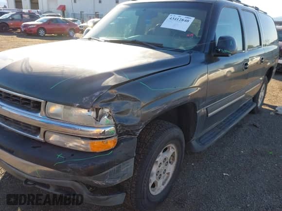 2004 Chevrolet Suburban LS z VIN 3GNFK16TX4G204048, wystawiony jako IAAI lot #43412840 z przebiegiem 210 106 mil mil oraz . Historia ofert i sprzedaży dostępna na DreamBid. Obrazek 6.
