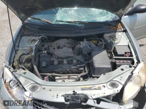 2005 Dodge Stratus SXT with VIN 1B3EL46T25N558935, listed as a Copart auction lot 62161245 with 134,784 mi miles and Salvage title. Bid and sale history available at DreamBid. Image 11.
