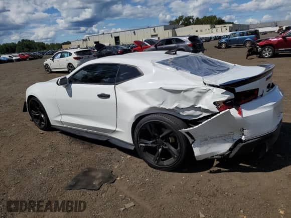 2018 Chevrolet Camaro 1LS с VIN 1G1FA1RSXJ0121582, выставлен на аукционе Copart как лот 70144895 с пробегом Не указан миль и Списание • Salvage title. История ставок и продаж доступна на DreamBid. Изображение 2.