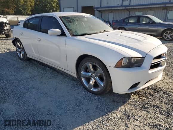 2014 Dodge Charger SXT с VIN 2C3CDXHG3EH221675, выставлен на аукционе Copart как лот 82565755 с пробегом 269 748 миль миль и Списание • Salvage title. История ставок и продаж доступна на DreamBid. Изображение 4.