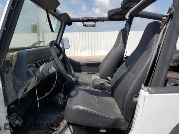1993 Jeep Wrangler S z VIN 1J4FY19P7PP228002, wystawiony jako Copart lot #60000135 z przebiegiem 137 858 mil mil oraz Czysty tytuł • Clean title. Historia ofert i sprzedaży dostępna na DreamBid. Obrazek 7.