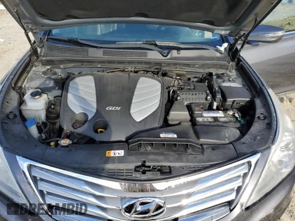 2013 Hyundai Azera с VIN KMHFH4JG7DA320448, выставлен на аукционе Copart как лот 71187445 с пробегом 97 432 миль миль и Списание • Salvage title. История ставок и продаж доступна на DreamBid. Изображение 11.
