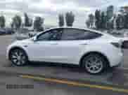 2023 Tesla Model Y Long Range with VIN 7SAYGAEE2PF763662, listed as a IAAI auction lot 43412618 with 43,857 mi miles and . Bid and sale history available at DreamBid. Image 14.