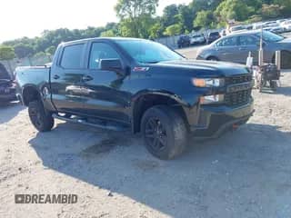 2021 Chevrolet Silverado 1500 Custom Trail Boss with VIN 3GCPYCEF9MG111279, listed as a IAAI auction lot 42548018 with 50,164 mi miles and . Bid and sale history available at DreamBid. Image 1.