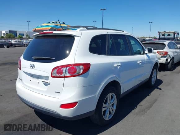 2012 Hyundai Santa Fe Limited with VIN 5XYZK4AG0CG169566, listed as a IAAI auction lot 42630700 with 105,352 mi miles and . Bid and sale history available at DreamBid. Image 4.