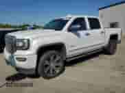 2016 GMC Sierra 1500 Denali z VIN 3GTU2PEJ2GG371785, wystawiony jako Copart lot #81668355 z przebiegiem 82 938 mil mil oraz Szkoda całkowita • Salvage title. Historia ofert i sprzedaży dostępna na DreamBid. Obrazek 1.