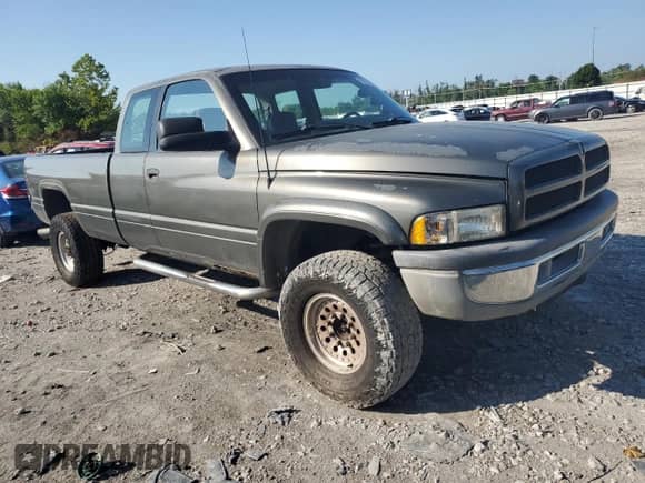 1996 Dodge 2500 with VIN 1B7KF23C1TJ123975, listed as a Copart auction lot 65028055 with 156,028 mi miles and Salvage title. Bid and sale history available at DreamBid. Image 4.