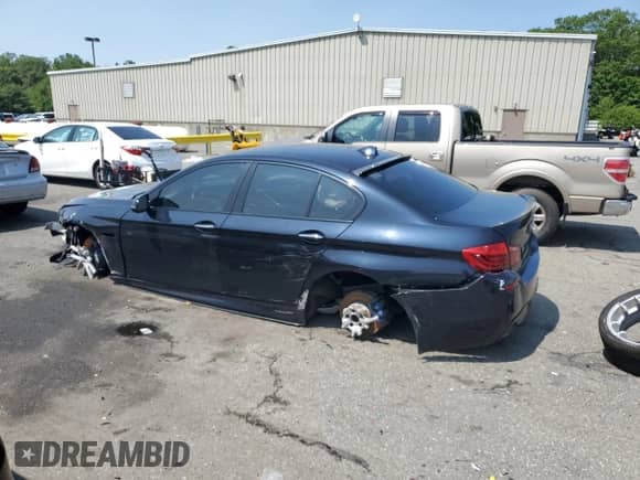 2016 BMW 5 Series 550i xDrive with VIN WBAKP9C52GG587591, listed as a Copart auction lot 58402505 with 94,384 mi miles and Salvage title. Bid and sale history available at DreamBid. Image 2.