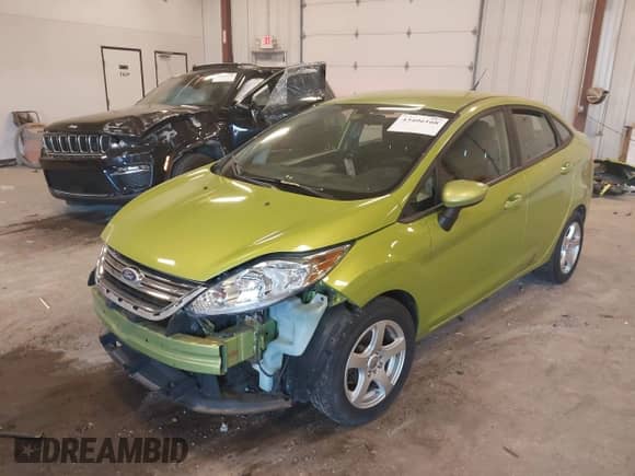 2011 Ford Fiesta SE z VIN 3FADP4BJ4BM164805, wystawiony jako IAAI lot #43406168 z przebiegiem 154 844 mil mil oraz . Historia ofert i sprzedaży dostępna na DreamBid. Obrazek 2.