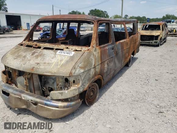 1999 Dodge Passenger with VIN 2B5WB35Z5XK529653, listed as a Copart auction lot 49242402 with Not provided miles and Salvage title. Bid and sale history available at DreamBid. Image 2.