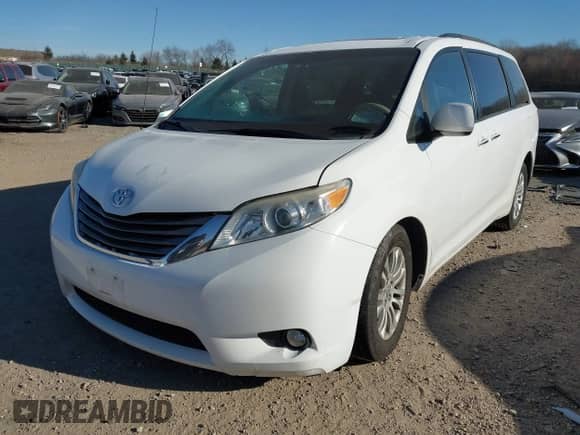 2013 Toyota Sienna XLE AAS with VIN 5TDYK3DC3DS308298, listed as a IAAI auction lot 41292280 with 165,638 mi miles and . Bid and sale history available at DreamBid. Image 2.