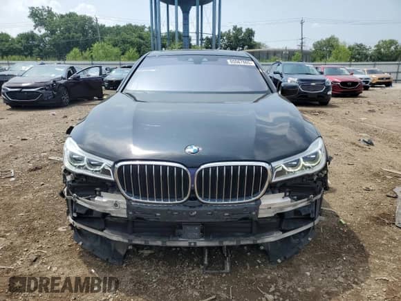 2016 BMW 7 Series 750i xDrive with VIN WBA7F2C5XGG417558, listed as a Copart auction lot 65567865 with 94,441 mi miles and Salvage title. Bid and sale history available at DreamBid. Image 5.