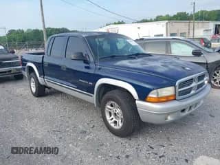 2002 Dodge Dakota SLT with VIN 1B7HL48X42S596546, listed as a IAAI auction lot 42469905 with 182,410 mi miles and . Bid and sale history available at DreamBid. Image 1.