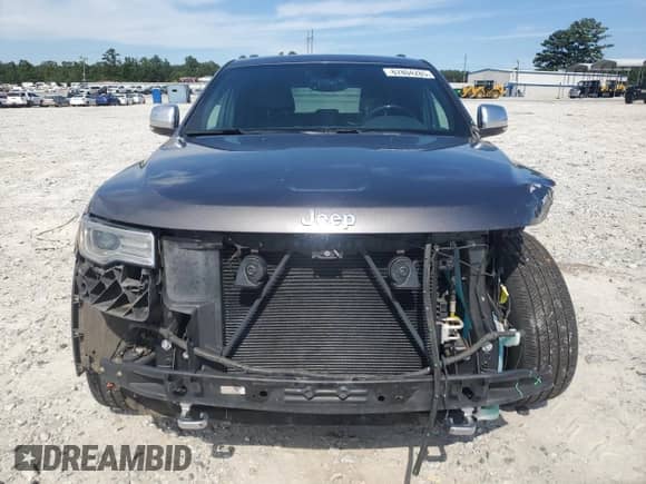 2017 Jeep Grand Cherokee Overland with VIN 1C4RJFCG9HC800659, listed as a Copart auction lot 67804285 with 105,483 mi miles and Salvage title. Bid and sale history available at DreamBid. Image 5.