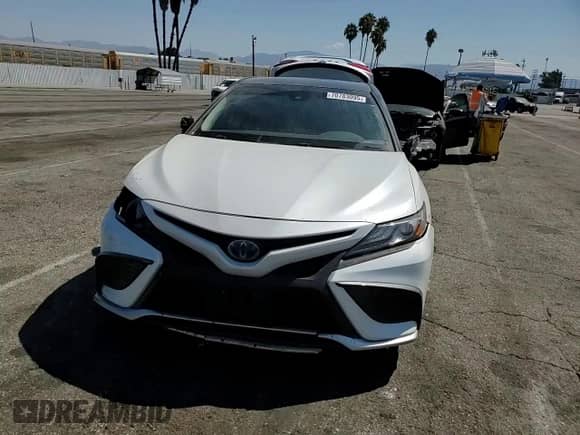 2021 Toyota Camry Hybrid XSE with VIN 4T1K31AK4MU023460, listed as a Copart auction lot 70783095 with 93,200 mi miles and Salvage title. Bid and sale history available at DreamBid. Image 13.