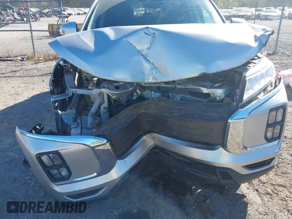 2022 Mitsubishi Outlander ES z VIN JA4ARUAU7NU008352, wystawiony jako IAAI lot #43356398 z przebiegiem 60 687 mil mil oraz . Historia ofert i sprzedaży dostępna na DreamBid. Obrazek 6.