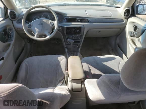 2005 Chevrolet Malibu Classic z VIN 1G1ND52FX5M178919, wystawiony jako Copart lot #50406205 z przebiegiem 188 892 mil mil oraz Nie do naprawy • Non repairable. Historia ofert i sprzedaży dostępna na DreamBid. Obrazek 8.