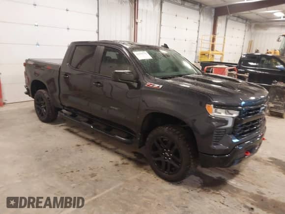 2024 Chevrolet Silverado 1500 LT Trail Boss z VIN 3GCUDFED5RG123564, wystawiony jako IAAI lot #42193775 z przebiegiem 26 302 mil mil oraz . Historia ofert i sprzedaży dostępna na DreamBid. Obrazek 1.