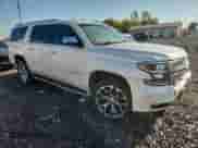 2015 Chevrolet Suburban LTZ with VIN 1GNSKKKC7FR727380, listed as a Copart auction lot 81000855 with 151,576 mi miles and Salvage title. Bid and sale history available at DreamBid. Image 4.