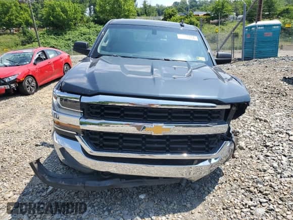 2017 Chevrolet Silverado 1500 LS with VIN 3GCUKNECXHG496668, listed as a Copart auction lot 60066214 with 76,002 mi miles and Salvage title. Bid and sale history available at DreamBid. Image 5.