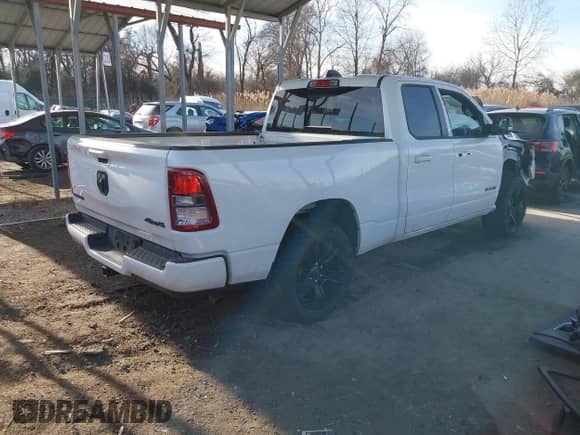 2022 Ram 1500 Big Horn with VIN 1C6RRFBG8NN263624, listed as a IAAI auction lot 41034883 with 42,409 mi miles and . Bid and sale history available at DreamBid. Image 4.