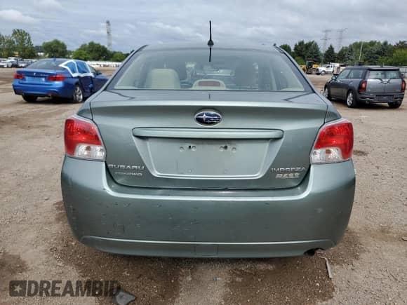 2014 Subaru Impreza Premium with VIN JF1GJAC69EH021218, listed as a Copart auction lot 69116255 with 50,899 mi miles and Salvage title. Bid and sale history available at DreamBid. Image 6.