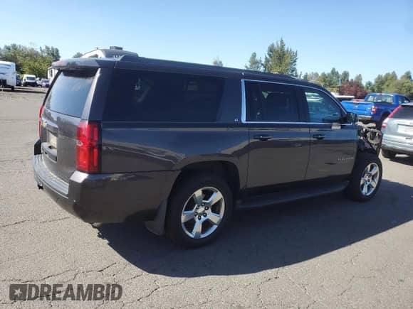 2015 Chevrolet Suburban LT с VIN 1GNSKJKC7FR710962, выставлен на аукционе Copart как лот 69211825 с пробегом 175 629 миль миль и Списание • Salvage title. История ставок и продаж доступна на DreamBid. Изображение 3.