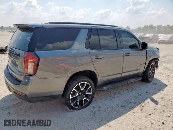 2021 Chevrolet Tahoe RST с VIN 1GNSKRKD5MR237261, выставлен на аукционе Copart как лот 80063185 с пробегом 71 523 миль миль и Списание • Salvage title. История ставок и продаж доступна на DreamBid. Изображение 3.