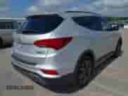 2018 Hyundai Santa Fe Ultimate with VIN 5XYZWDLA8JG518676, listed as a IAAI auction lot 42665116 with 108,564 mi miles and . Bid and sale history available at DreamBid. Image 4.