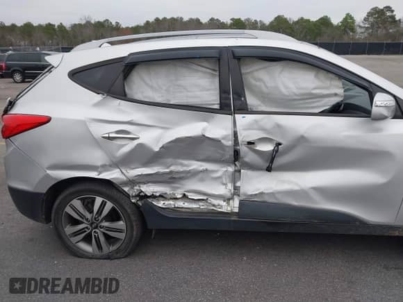 2014 Hyundai Tucson Limited z VIN KM8JU3AG0EU933074, wystawiony jako IAAI lot #41532272 z przebiegiem 158 076 mil mil oraz . Historia ofert i sprzedaży dostępna na DreamBid. Obrazek 19.