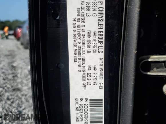 2013 Chrysler 300 C John Varvatos Limited Edition z VIN 2C3CCADG7DH741429, wystawiony jako Copart lot #68953515 z przebiegiem 70 062 mil mil oraz Szkoda całkowita • Salvage title. Historia ofert i sprzedaży dostępna na DreamBid. Obrazek 12.