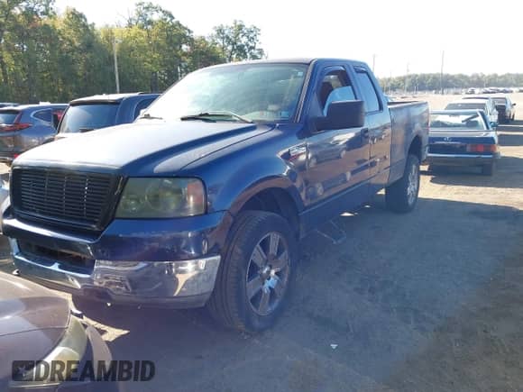 2005 Ford F-150 XLT with VIN 1FTPX14535NA07699, listed as a IAAI auction lot 43390118 with 241,541 mi miles and . Bid and sale history available at DreamBid. Image 2.