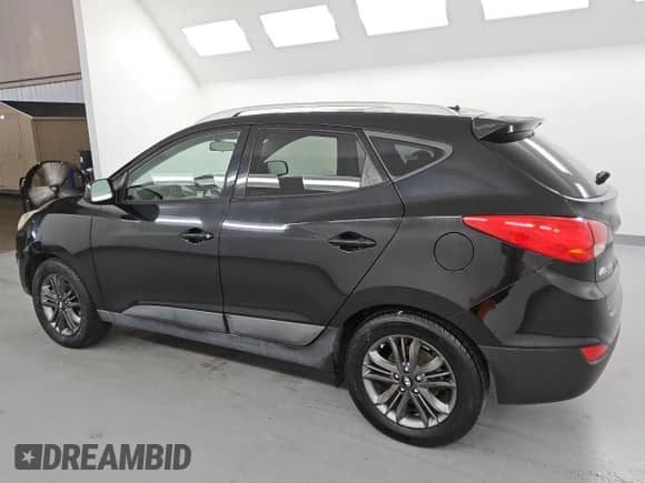 2015 Hyundai Tucson SE z VIN KM8JUCAG1FU038131, wystawiony jako Copart lot #84521605 z przebiegiem 147 573 mil mil oraz Czysty tytuł • Clean title. Historia ofert i sprzedaży dostępna na DreamBid. Obrazek 2.