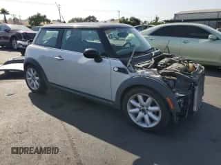 2013 MINI Hardtop with VIN WMWSU3C58DT371379, listed as a Copart auction lot 59606005 with 59,901 mi miles and Salvage title. Bid and sale history available at DreamBid. Image 4.