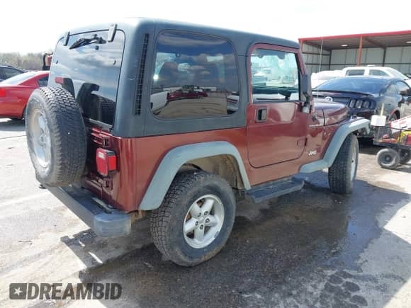 2001 Jeep Wrangler SE with VIN 1J4FA29P21P300094, listed as a IAAI auction lot 41871446 with 125,098 mi miles and . Bid and sale history available at DreamBid. Image 4.