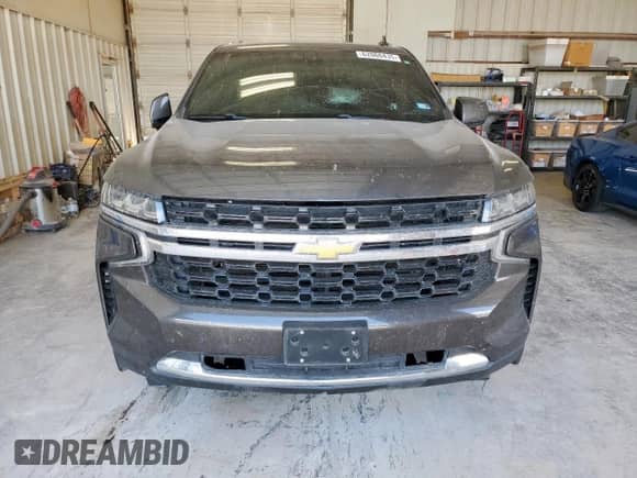 2021 Chevrolet Tahoe LS z VIN 1GNSCMKD2MR328777, wystawiony jako Copart lot #62066435 z przebiegiem Nie podano mil oraz Czysty tytuł • Clean title. Historia ofert i sprzedaży dostępna na DreamBid. Obrazek 5.