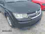 2013 Dodge Journey American Value z VIN 3C4PDCAB1DT695392, wystawiony jako IAAI lot #43098134 z przebiegiem 209 536 mil mil oraz . Historia ofert i sprzedaży dostępna na DreamBid. Obrazek 6.