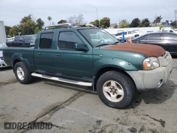 2002 Nissan Frontier SE with VIN 1N6ED29X92C303699, listed as a Copart auction lot 49874555 with 323,825 mi miles and Clean title. Bid and sale history available at DreamBid. Image 4.